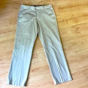 Men’s khaki flex Van Heusen pants.